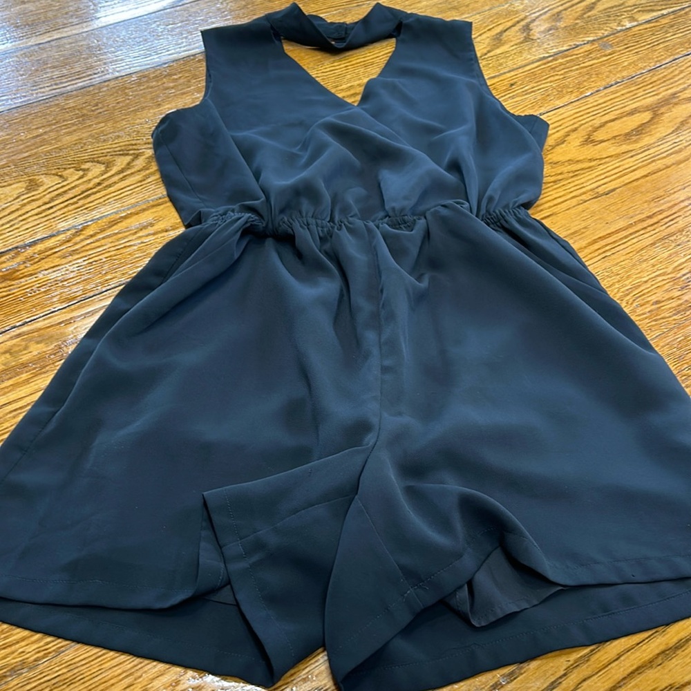 Skies are Blue brand dressy high neck black romper. Fully lined. Size Small.